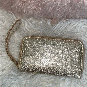glittery gold wristlet